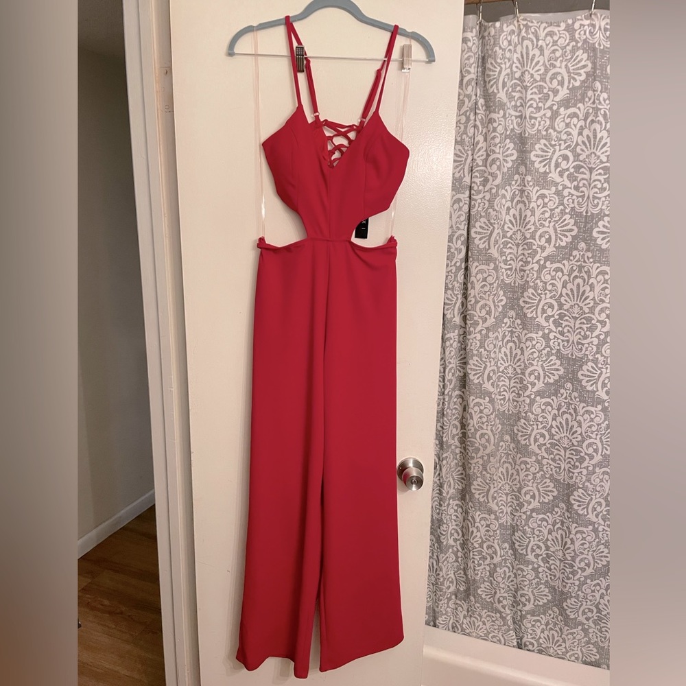 Red Romper/jumpsuit, flared pant .size small